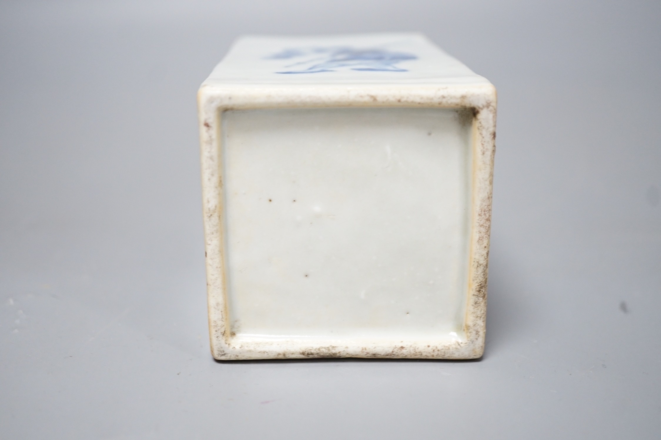 A 19th century Chinese blue and white square brushpot, 12cm